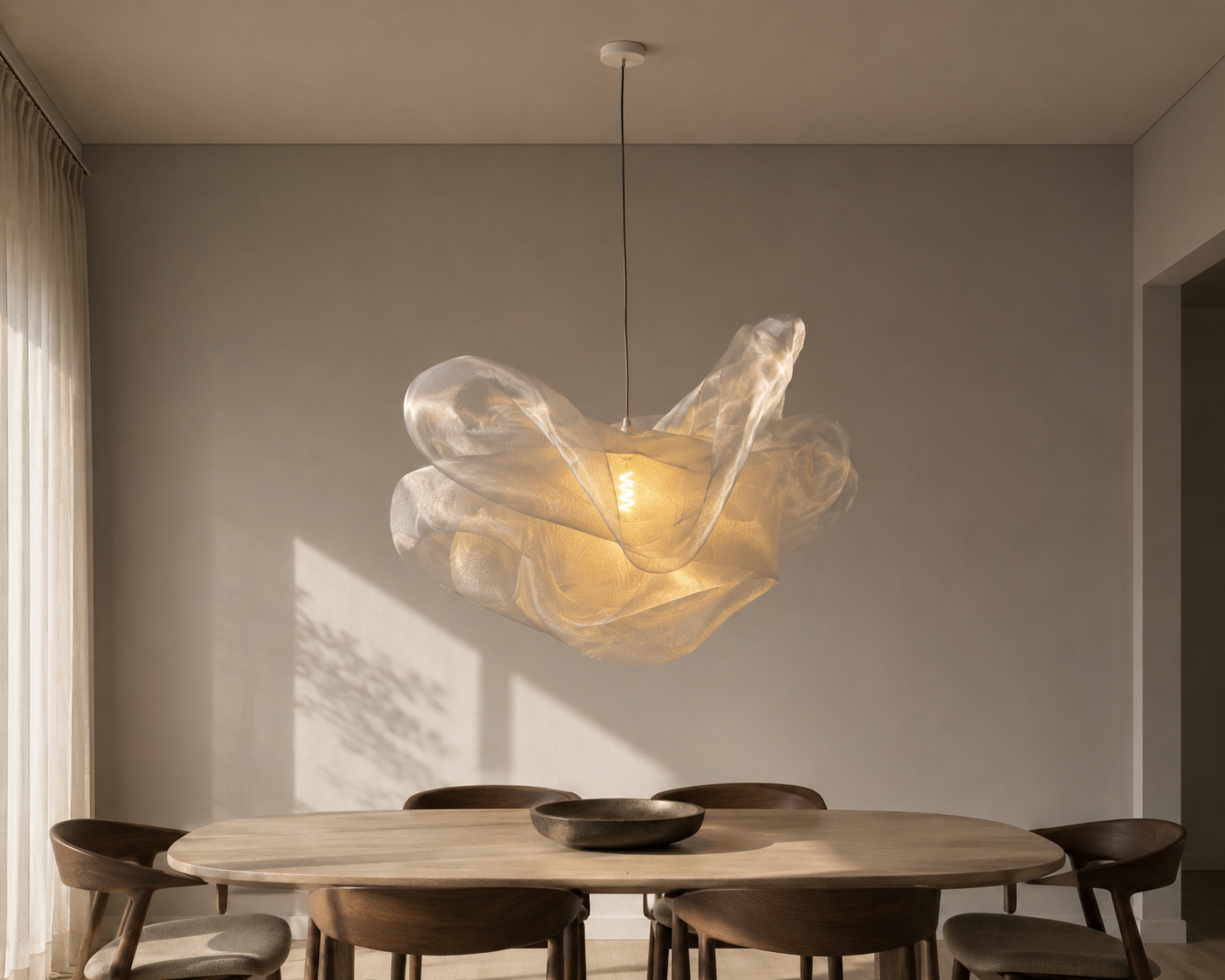 Illuminated Industrial Mesh Pendant above a dining table