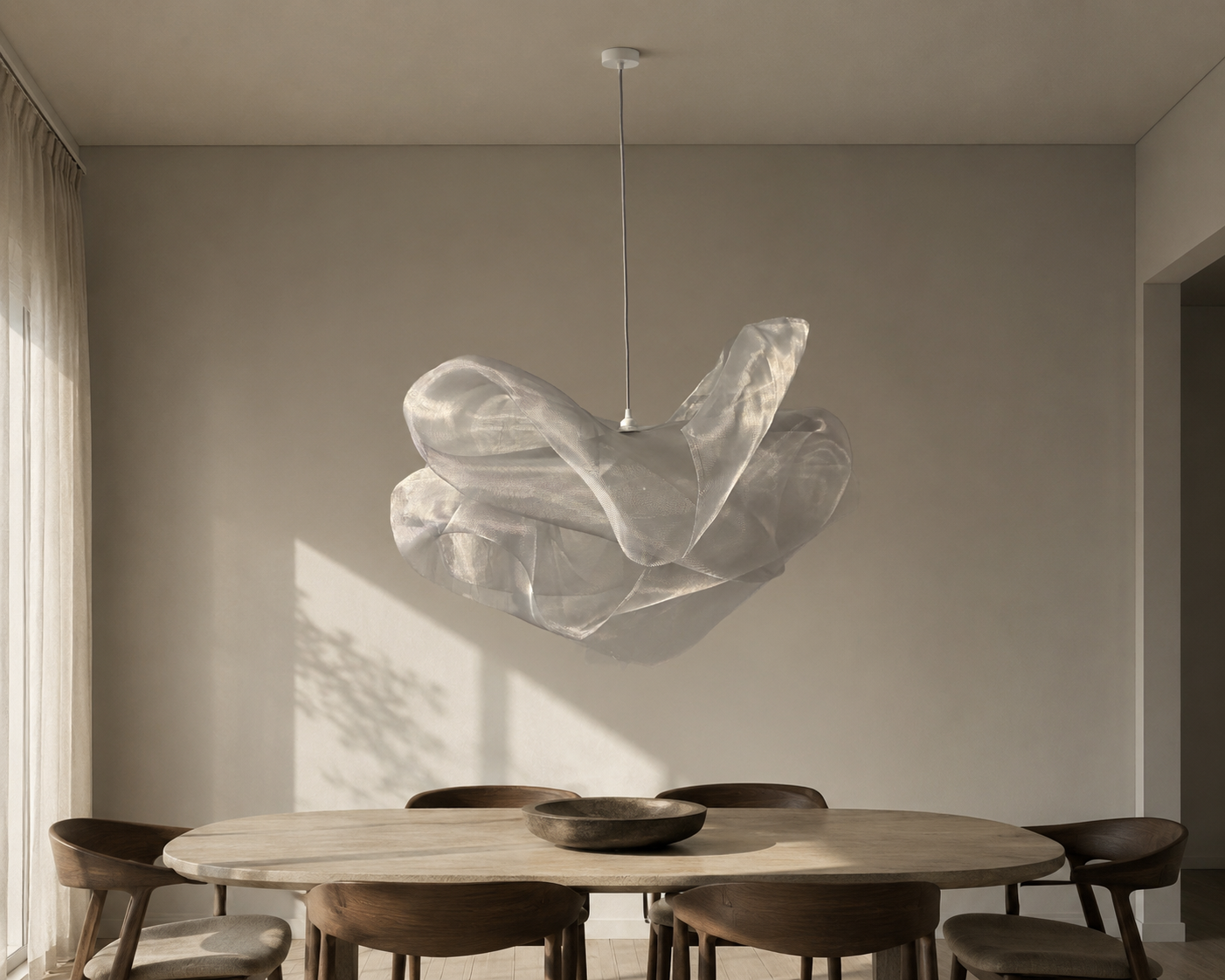 Industrial Mesh Pendant suspended above a dining table in a contemporary dining room